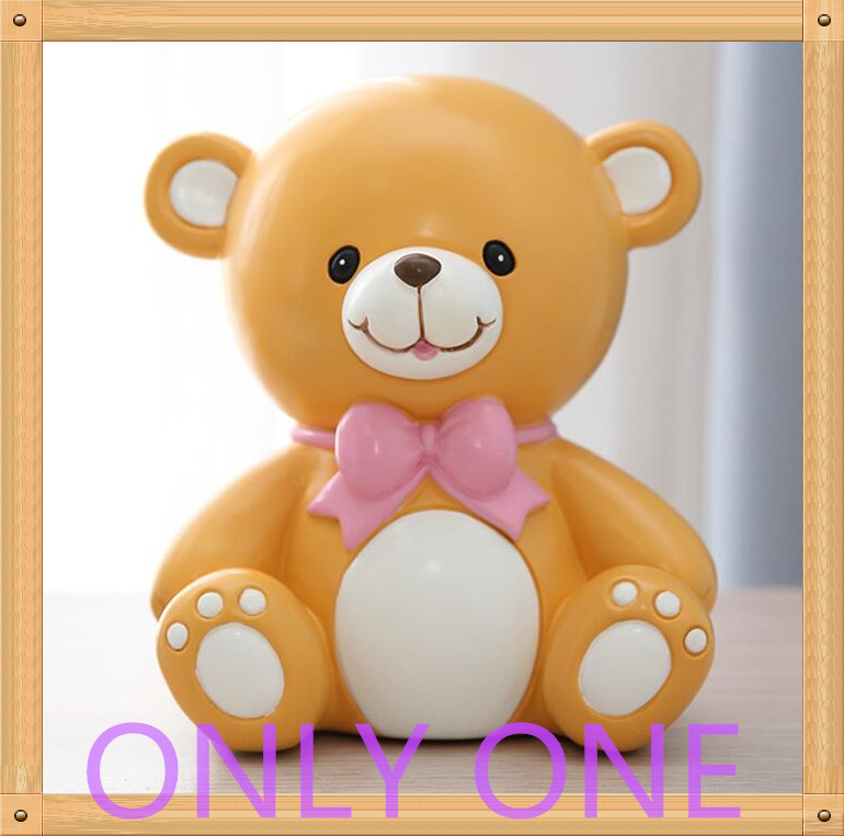 Lovely bear saving bank money bank